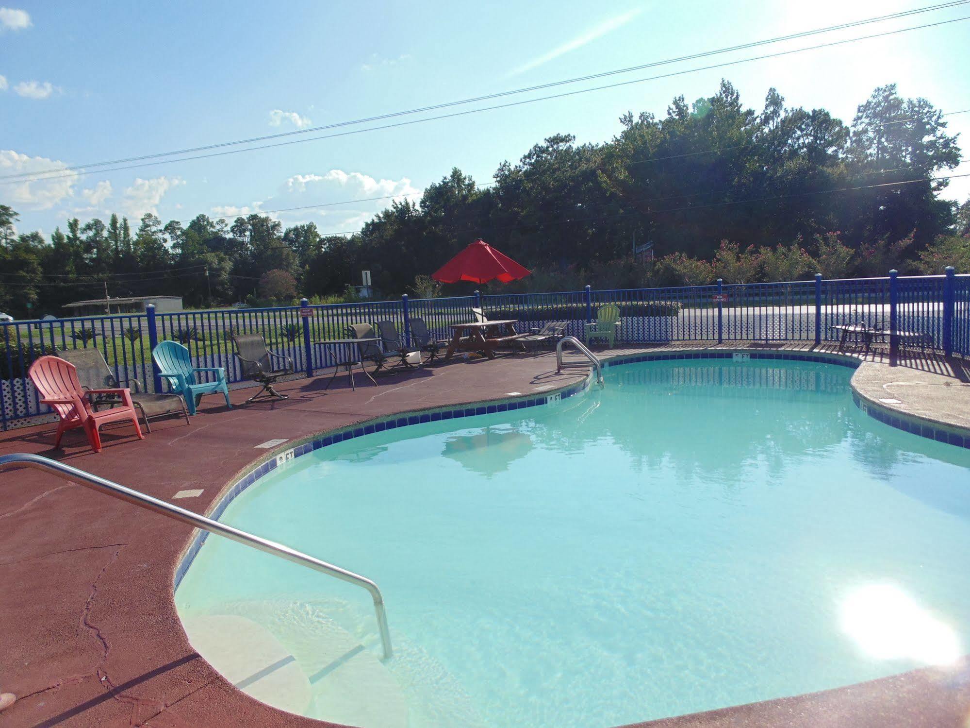 Log Cabin Inn Bay Minette Екстериор снимка